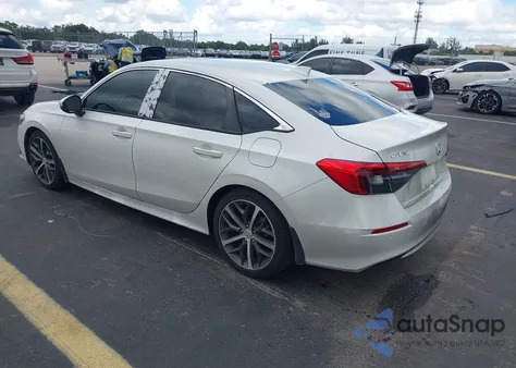 2023 Honda Civic Touring z USA, uszkodzony, nr VIN 2HGFE1F90PH324323